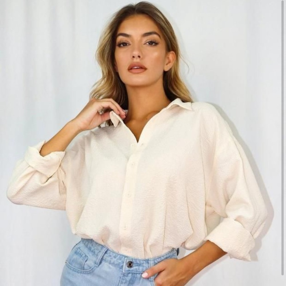 Oversized long sleeve button down shirt.